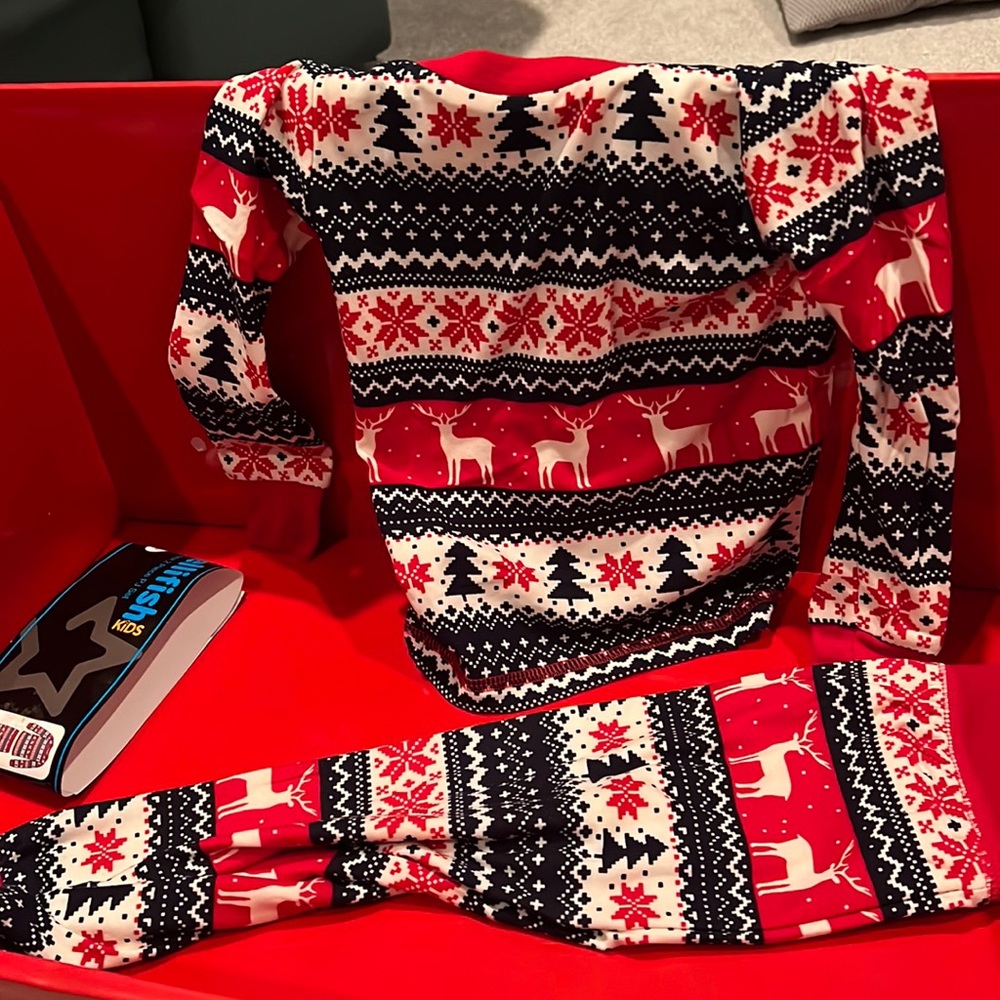 Brand new Christmas Pajamas ! So comfy. 95% polyester 5% spandex
